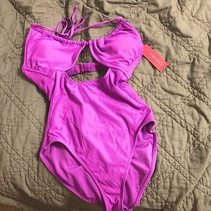 Light purple bathing suit. Size Medium 4-6 backless